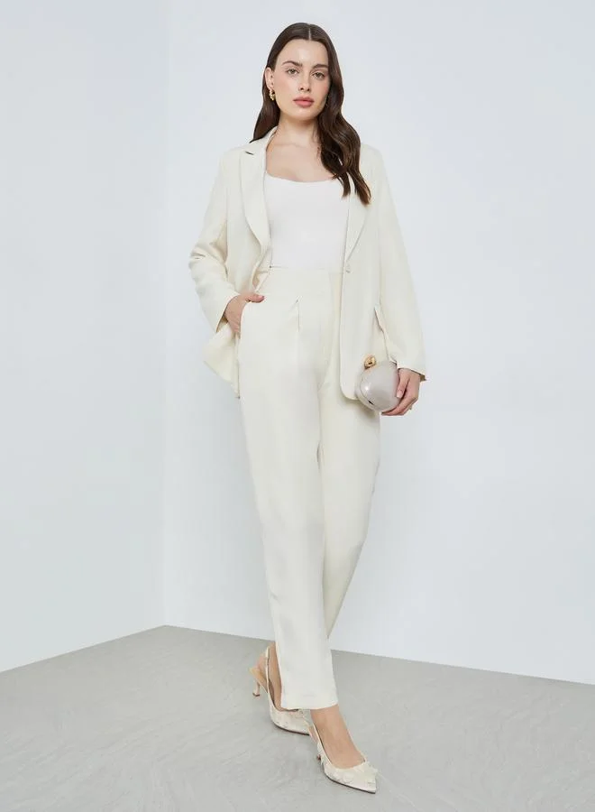 ستايلي بليزر كريمي واسع بياقة مدببة